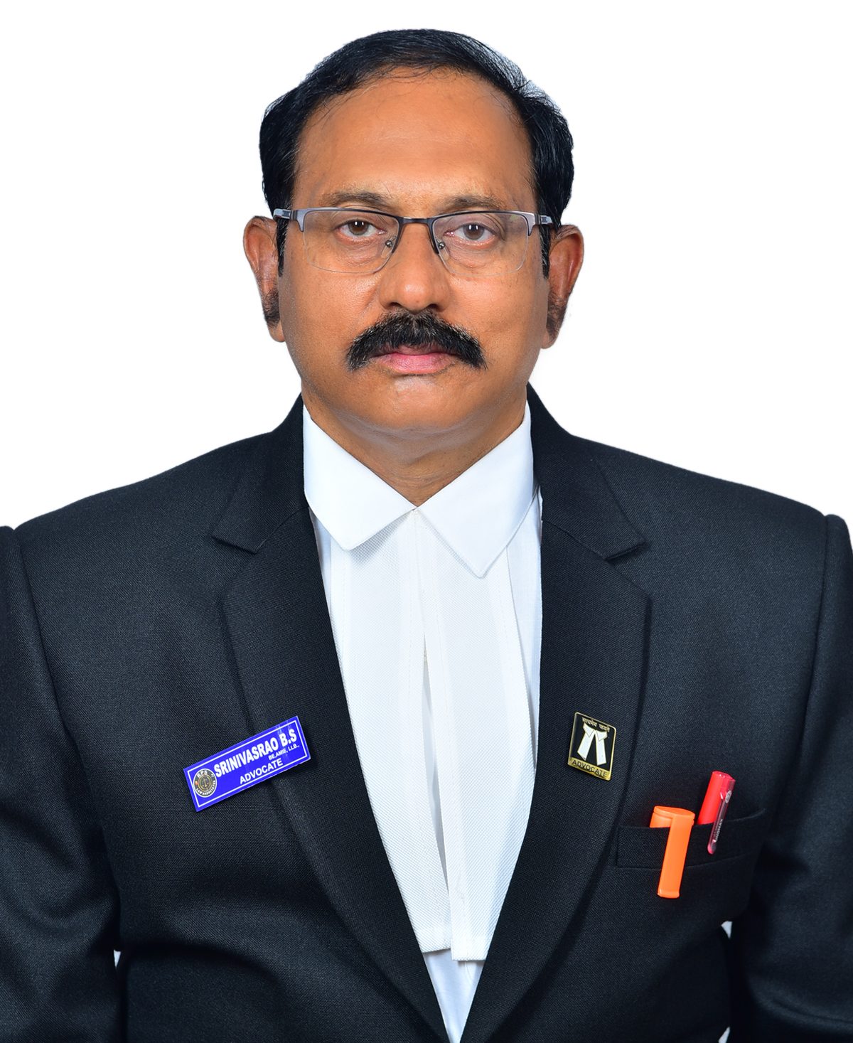A distinguished High Court lawyer, with a mustache and glasses, is pictured in a black robe and white band against a white background.